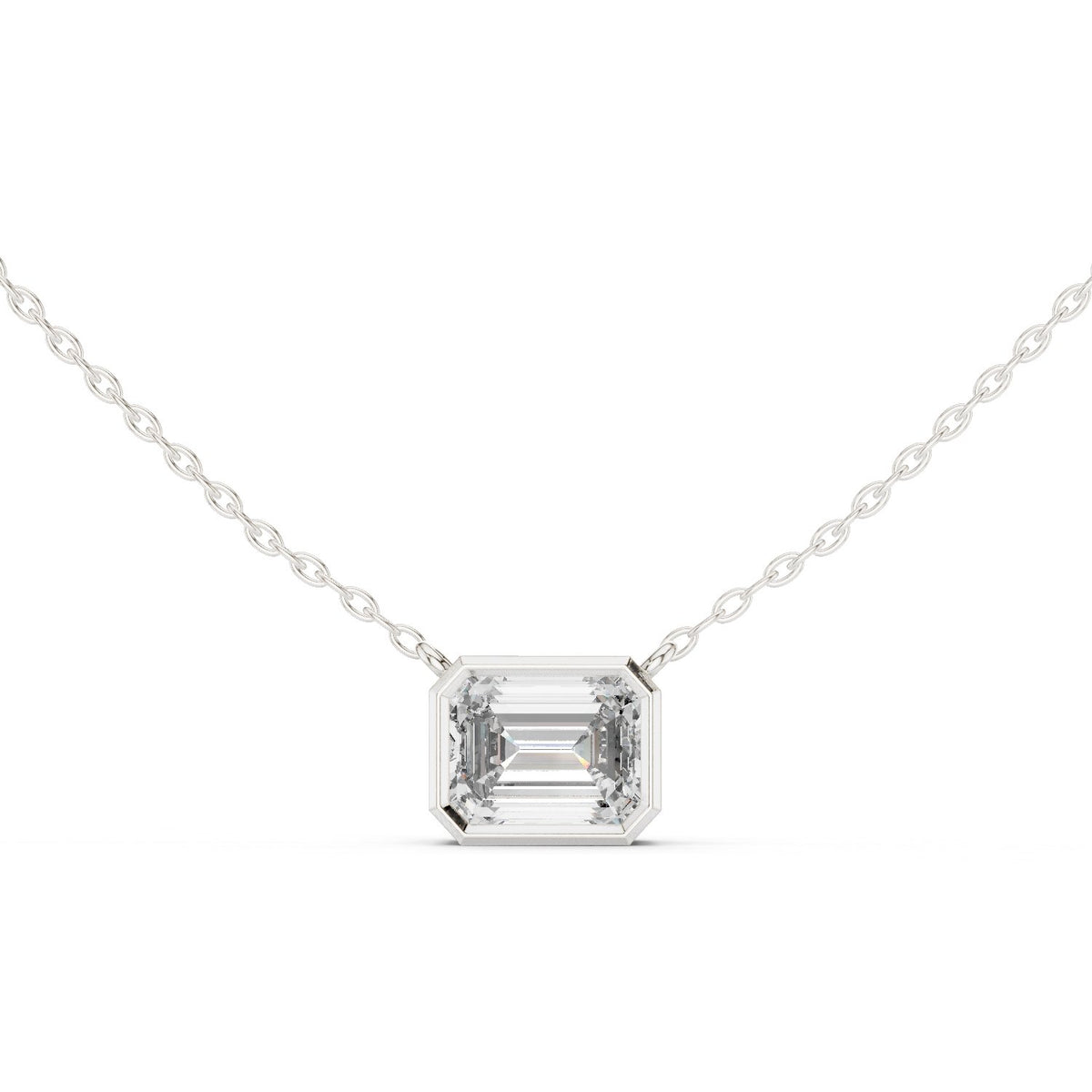 East-West Emerald Bezel Diamond Pendant