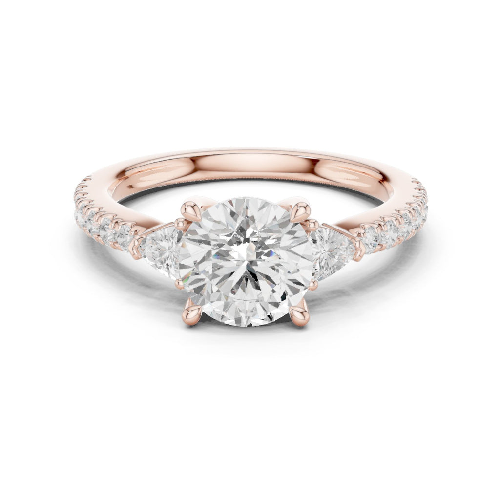 Round Diamond Three Stone Engagement Ring with Trilliant Sides and Pavé Band