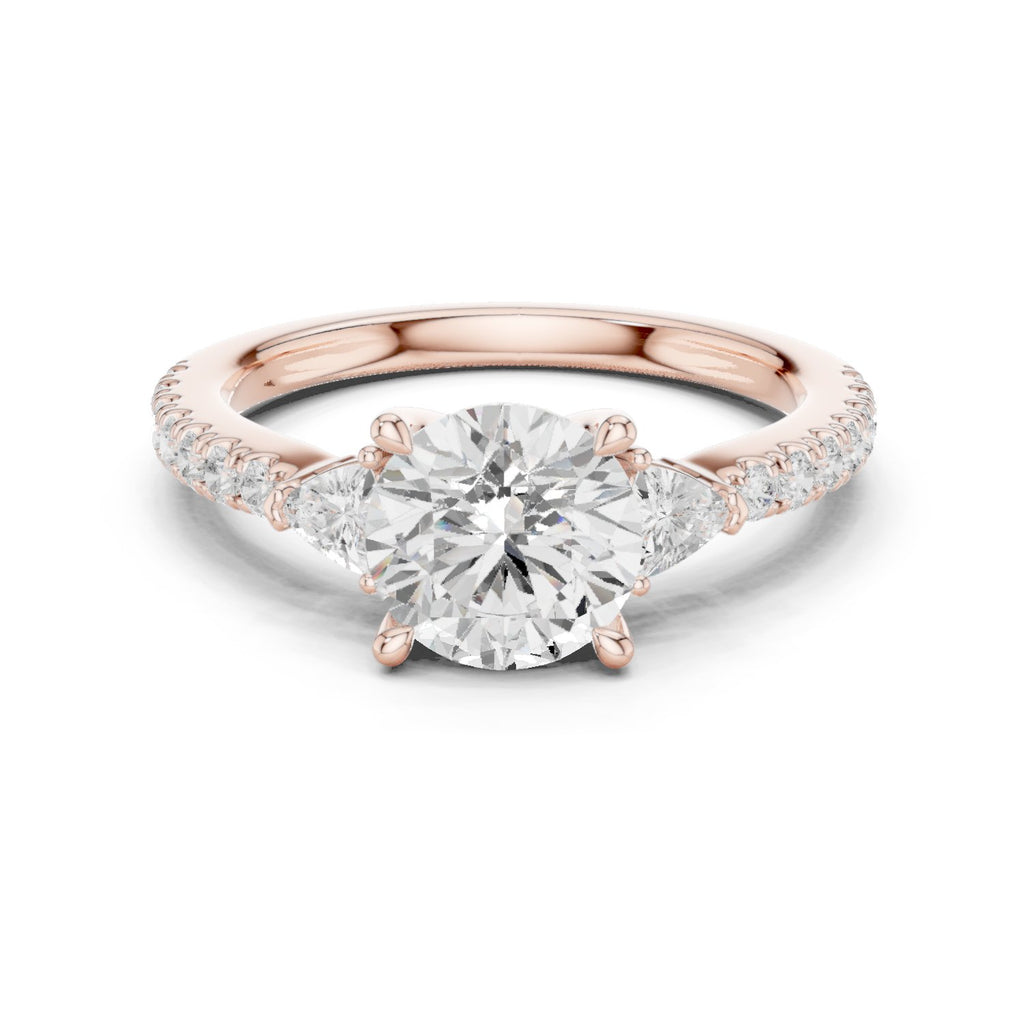 Round Diamond Three Stone Engagement Ring with Trilliant Sides and Pavé Band