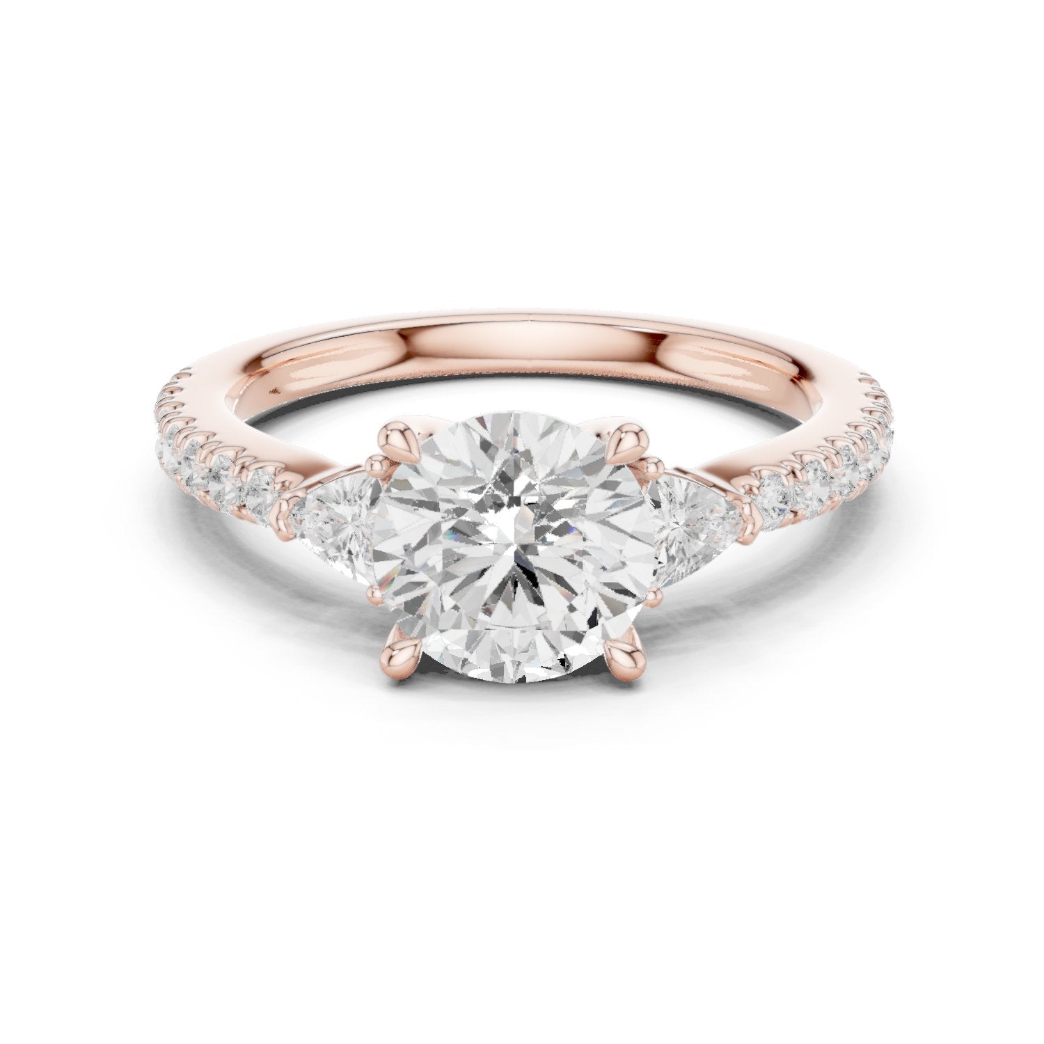 Round Diamond Three Stone Engagement Ring with Trilliant Sides and Pavé Band