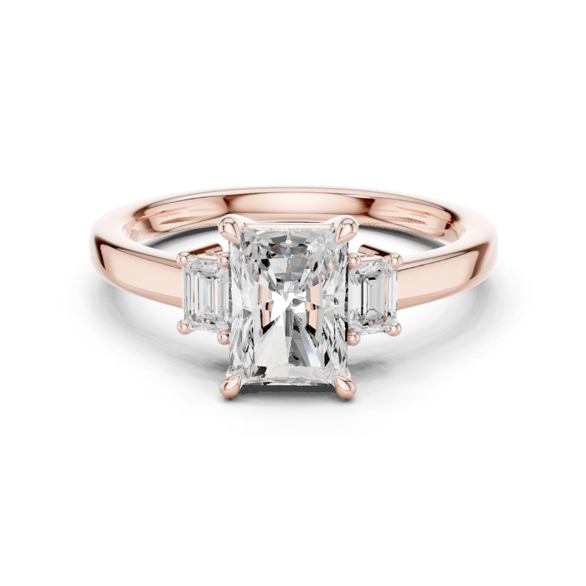 Radiant Cut Three Stone Engagement Ring with Emerald Sides