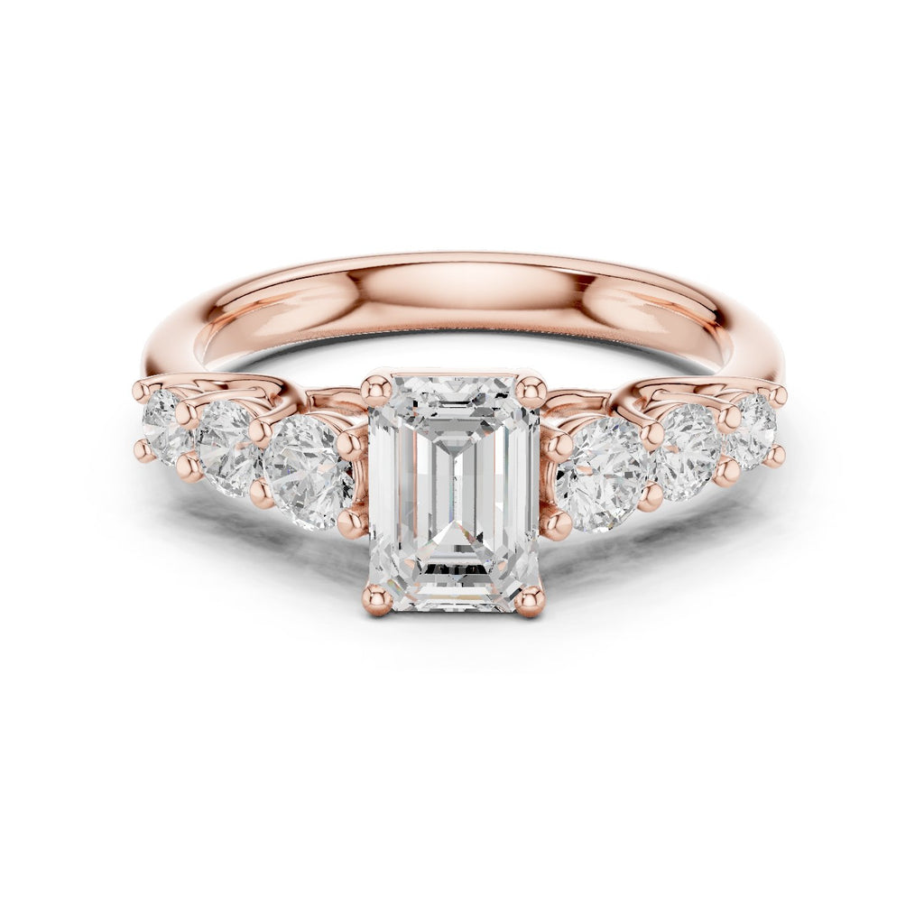 Emerald Cut Engagement Ring with Round Side Accents on Chevron Shoulders