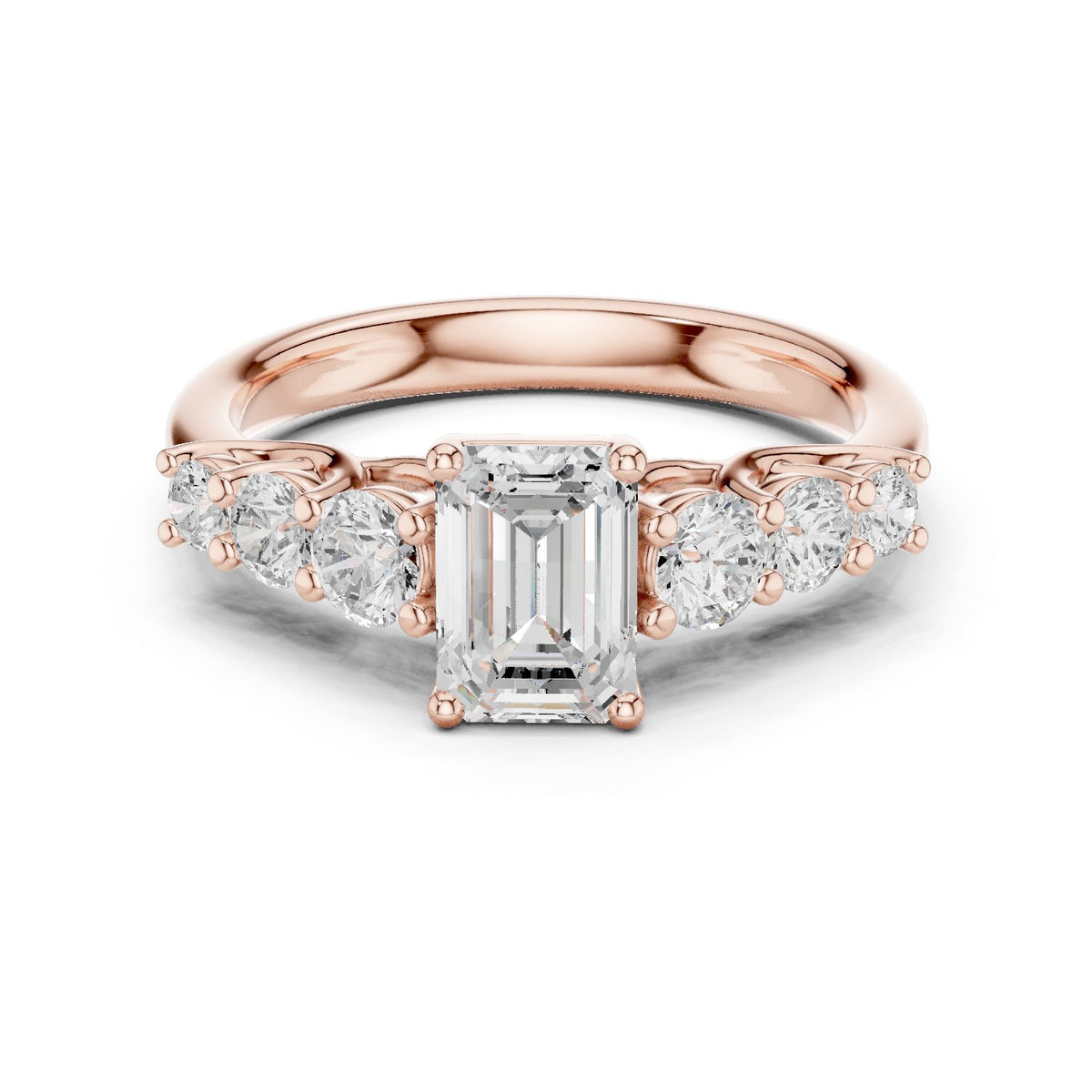 Emerald Cut Engagement Ring with Round Side Accents on Chevron Shoulders