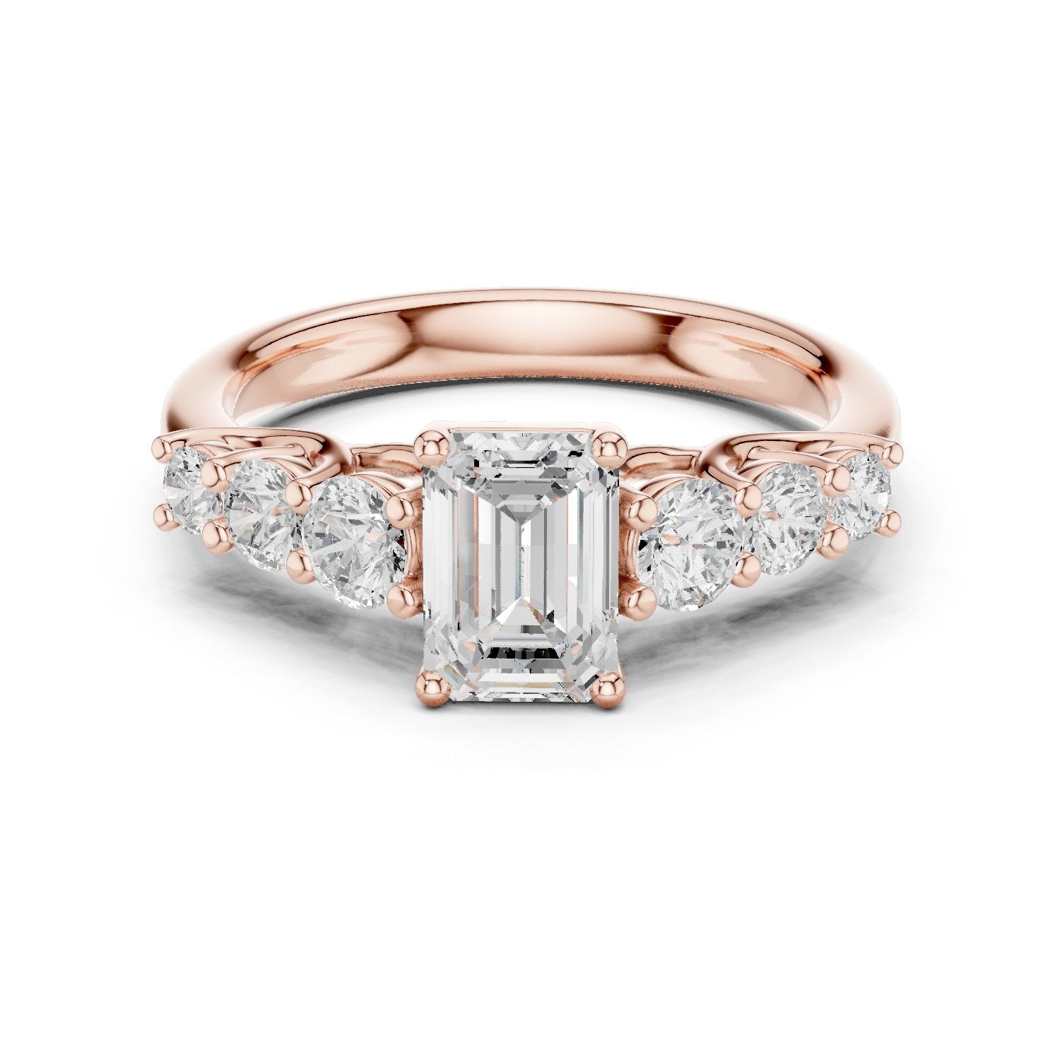 Emerald Cut Engagement Ring with Round Side Accents on Chevron Shoulders