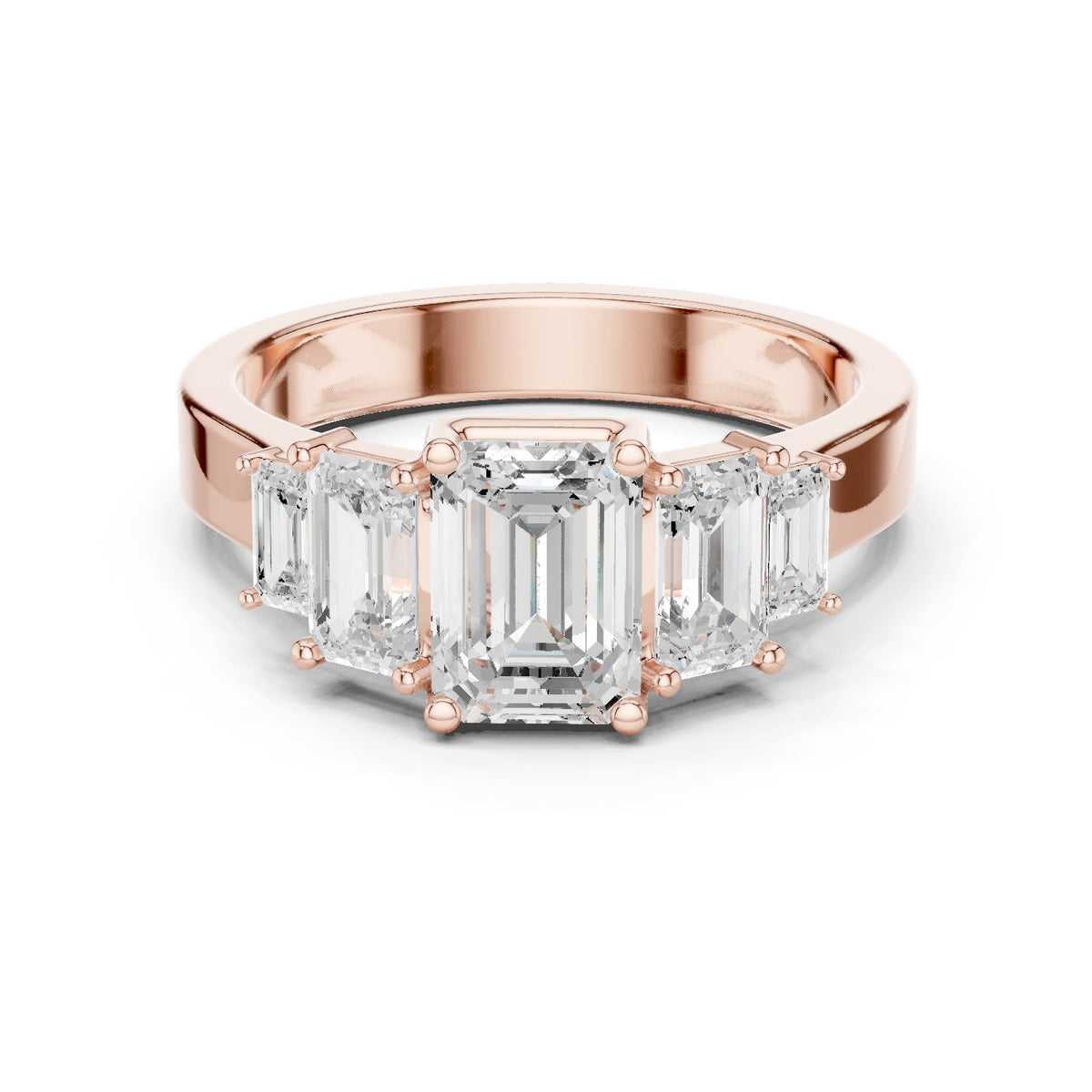 Emerald Cut Engagement Ring with Graduated Emerald Side Accents