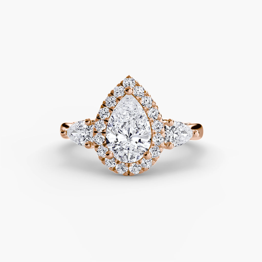 Three-Stone Ring with Halo - diamond engagement ring - VYKA Diamonds
