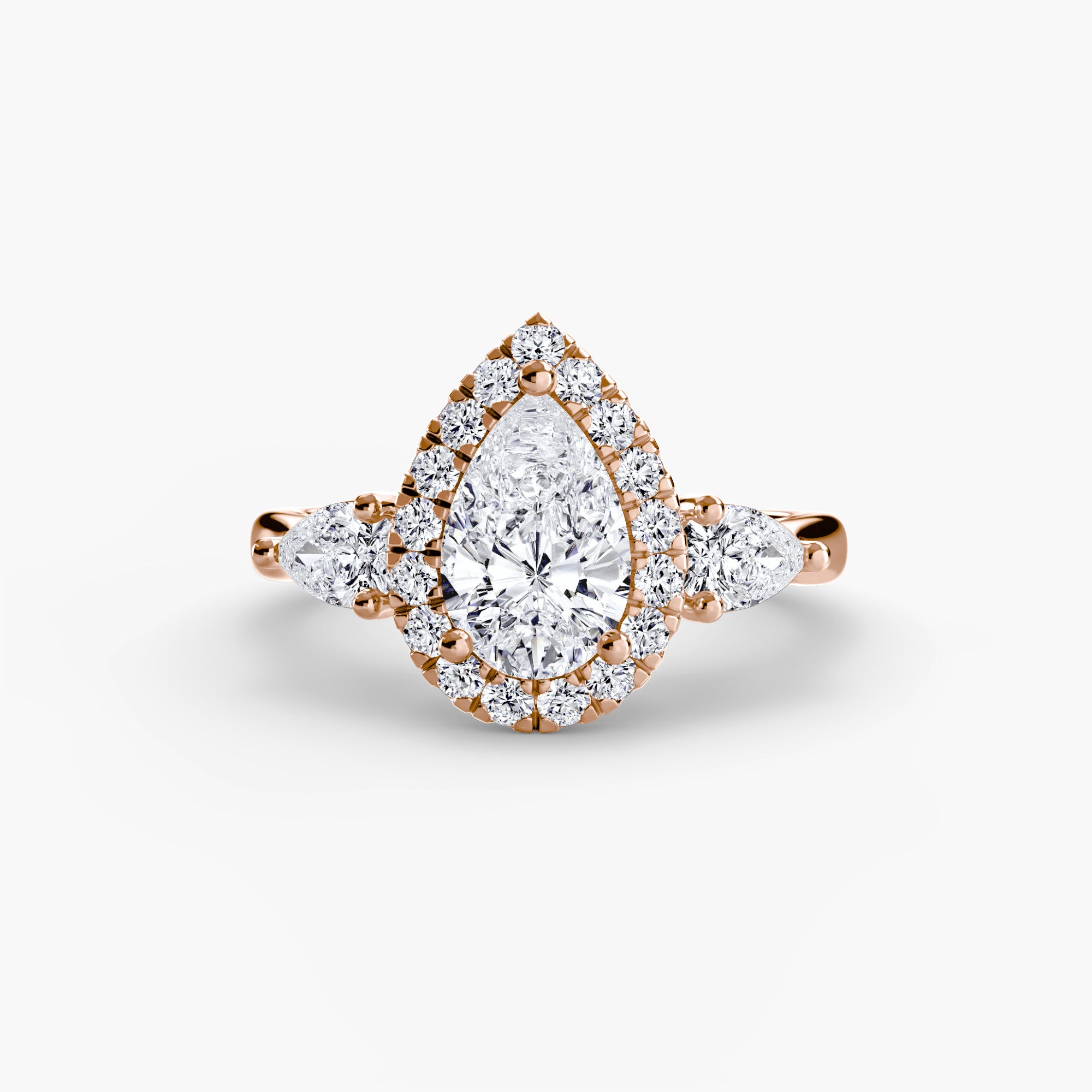 Three-Stone Ring with Halo - diamond engagement ring - VYKA Diamonds