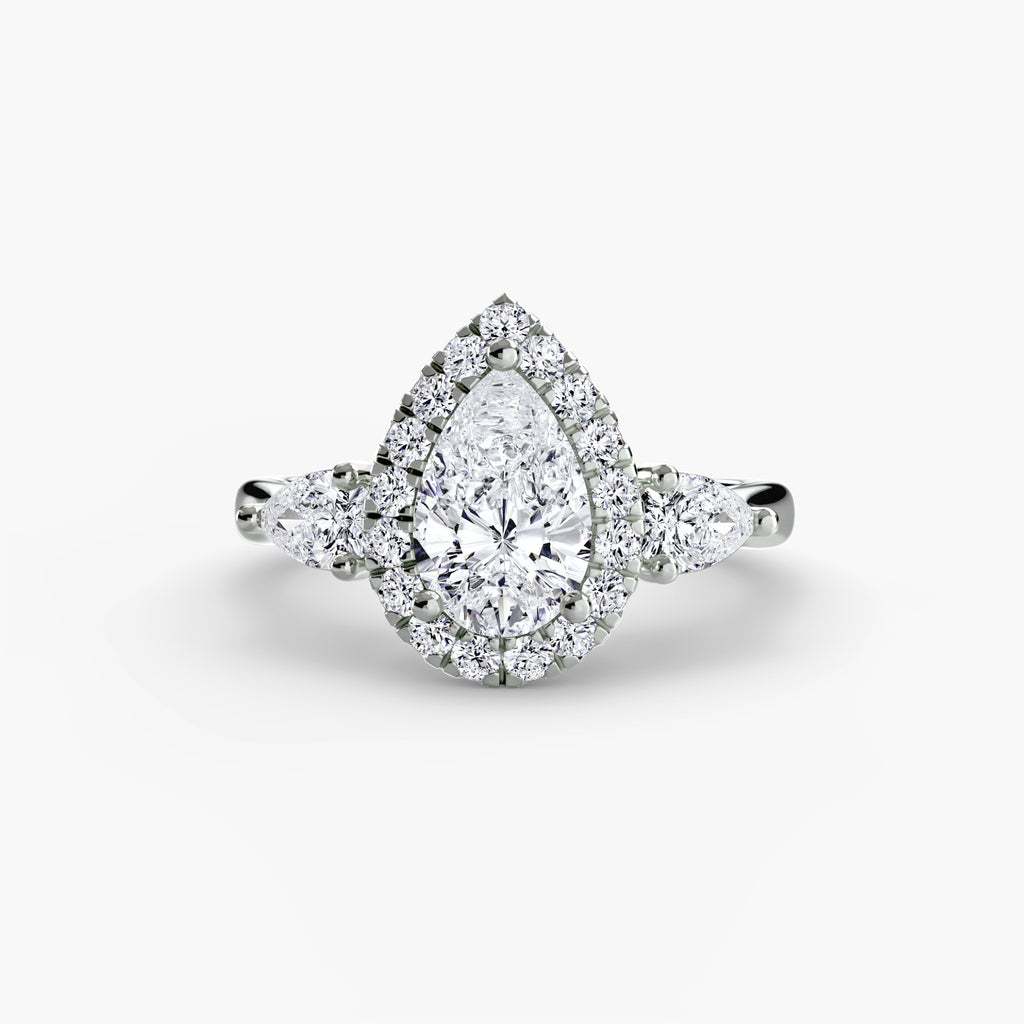 Three-Stone Ring with Halo - diamond engagement ring - VYKA Diamonds