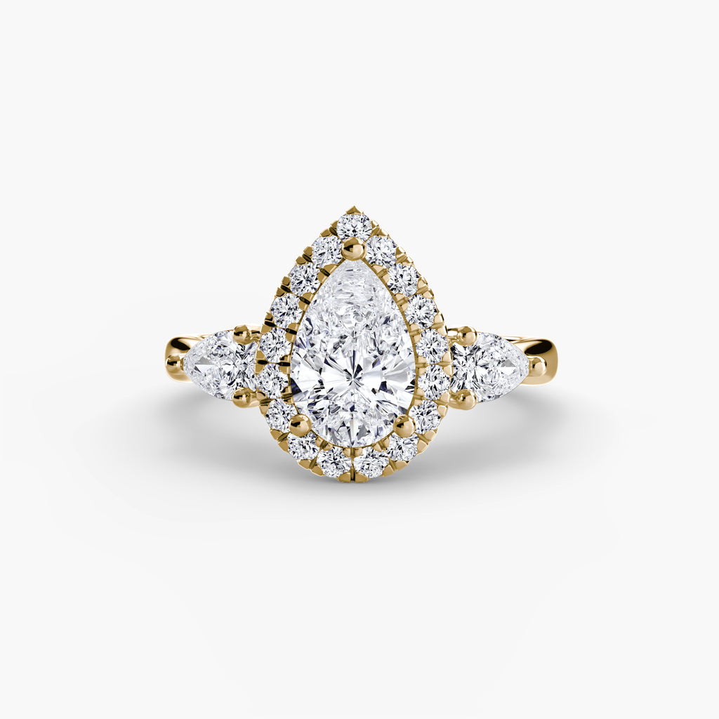 Three-Stone Ring with Halo - diamond engagement ring - VYKA Diamonds