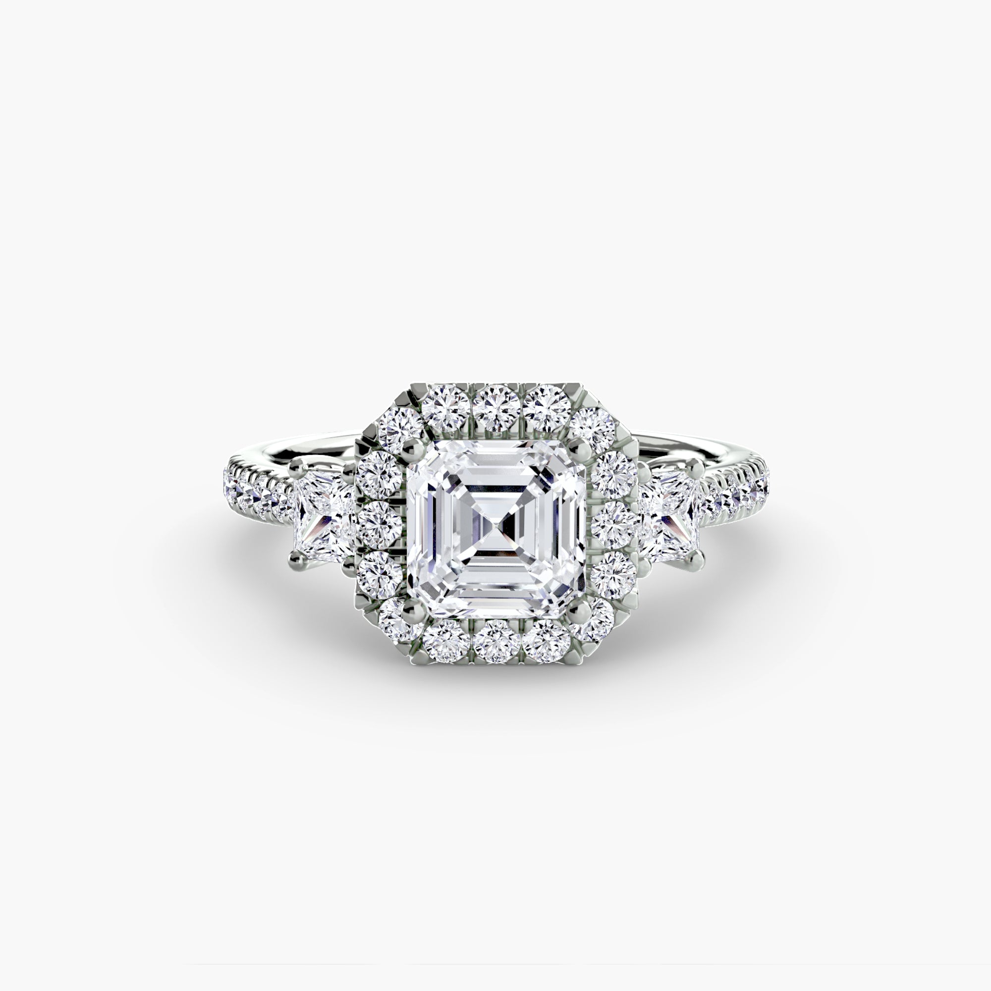Three-Stone Ring with Halo 2 - diamond engagement ring - VYKA Diamonds