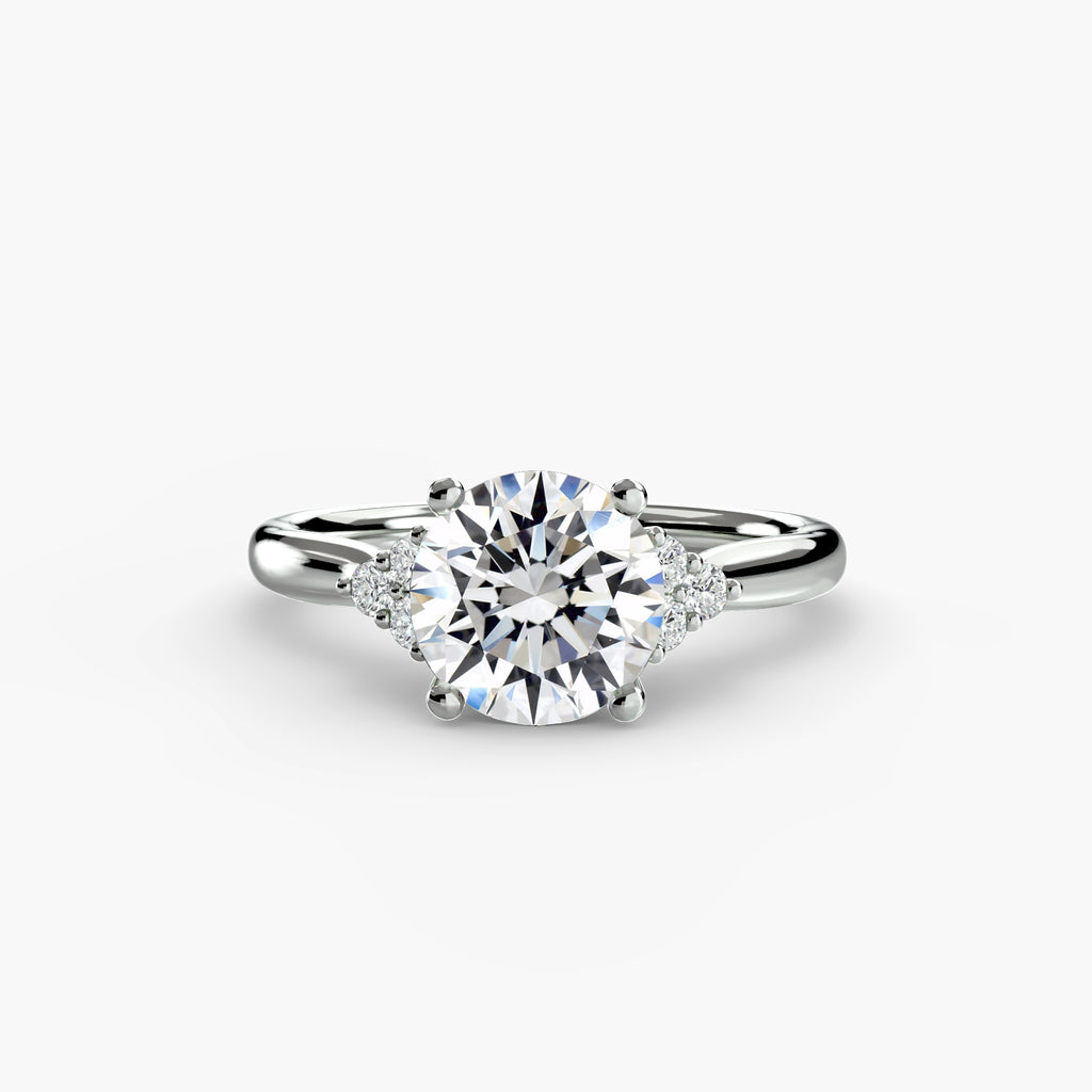 Solitaire with Cluster Shoulders - VYKA Diamonds