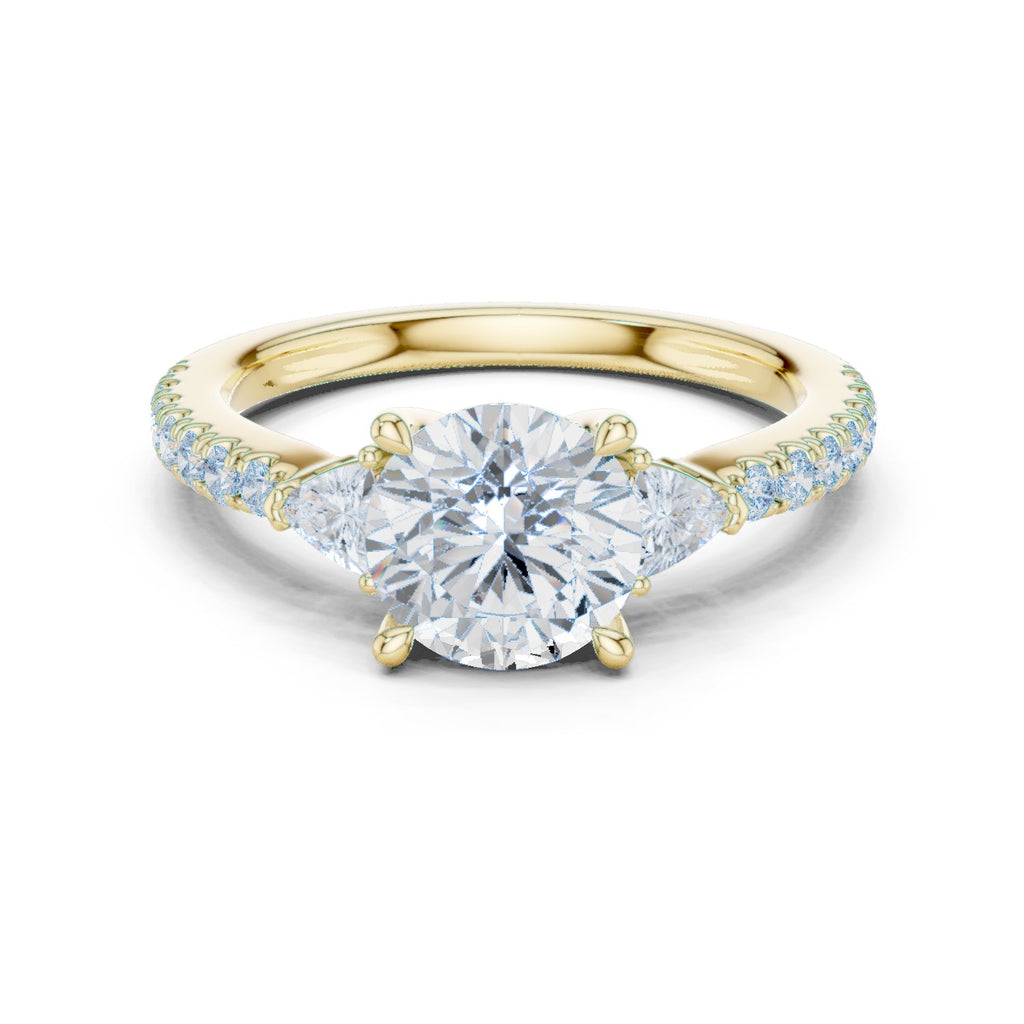 Round Diamond Three Stone Engagement Ring with Trilliant Sides and Pavé Band